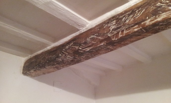 And they then get progressively worse until you get to this beam! I've neatened up all the rough plaster and painted it so it looks a bit neater at least.